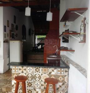 Dapur atau dapur kecil di Casa Aconchegante Lazer e Descanso