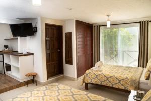 Postel nebo postele na pokoji v ubytování Hotel Amar Inn