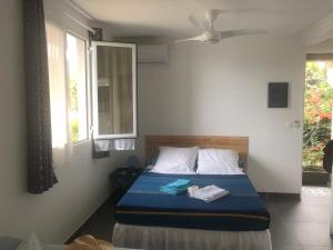 Letto o letti in una camera di Bleu Cannelle et Petimo