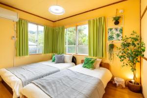 Deluxe Room 130平米 URUMAHOTEL客房内的一张或多张床位