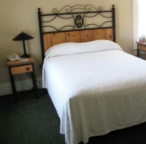 Ένα ή περισσότερα κρεβάτια σε δωμάτιο στο Hotel Eklund