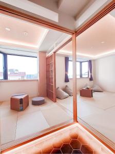 Postel nebo postele na pokoji v ubytování Hotel Imagine Kyoto