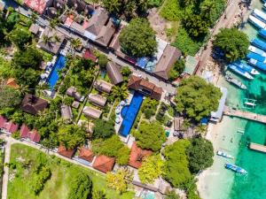 an overhead view of a house and the water at Oceans 5 Dive Resort in Gili Air