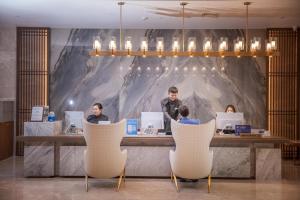 Hosté ubytování Wyndham Shiyan Downtown + 32 fotografií