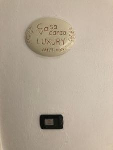 Certifikát, hodnocení, plakát nebo jiný dokument vystavený v ubytování Luxury Affitti brevi