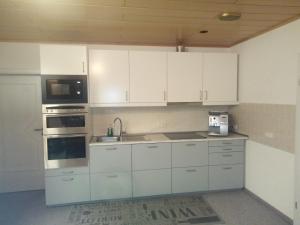 Kuchyň nebo kuchyňský kout v ubytování Ferienwohnung Lang