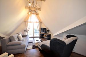 TV a/nebo společenská místnost v ubytování C l e a n&C o z y Apartmani Divcibare