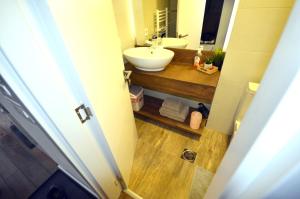 Koupelna v ubytování C l e a n&C o z y Apartmani Divcibare
