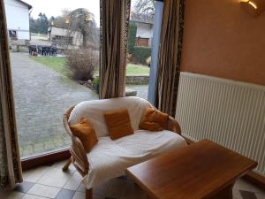 A seating area at La Source d'Arimont