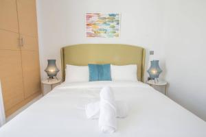 Stayhere Rabat - Agdal 2 - Classic Residence客房内的一张或多张床位