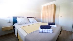 Tempat tidur dalam kamar di Vakantiewoning Kaviaar
