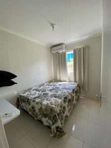 מיטה או מיטות בחדר ב-Solar de Peroba