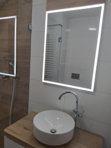 Kúpeľňa v ubytovaní Apartament z widokiem