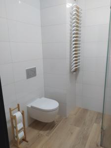 Kúpeľňa v ubytovaní Apartament z widokiem