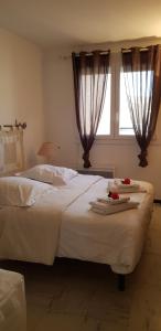 Een bed of bedden in een kamer bij Appartement Anna Grande Vue Mer
