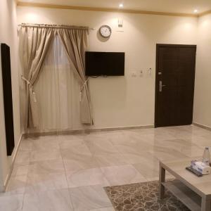 تلفاز و/أو أجهزة ترفيهية في روح الأصيلة للوحدات السكنية المفروشة Roh Al Aseilah for Residential Furnished Units