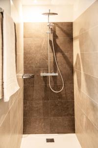 a bathroom with a shower with a sink at Willmüllerhof in Perca