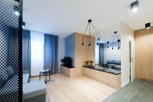 Kuchyňa alebo kuchynka v ubytovaní D Apartments Centrum Jurowiecka II