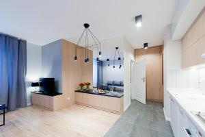 Kuchyňa alebo kuchynka v ubytovaní D Apartments Centrum Jurowiecka II