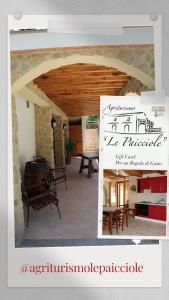 a picture of a house with a sign in a room at Agriturismo Le Paicciole in CastellʼAzzara