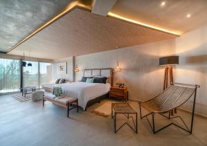 Postel nebo postele na pokoji v ubytování Mvngata Beach Hotel