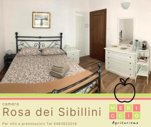 A bed or beds in a room at Meriggio Agriturismo