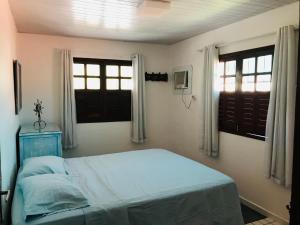 Postel nebo postele na pokoji v ubytování Condomínio Portais do Francês- Apto - PRAIA DO FRANCÊS/AL