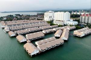 an aerial view of a group of houses in the water at Wonderland Private Chalet at Port Dickson in Port Dickson