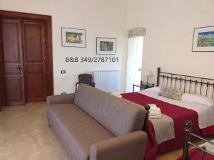 Posteľ alebo postele v izbe v ubytovaní B&B Batarà - "La Terrazza del Centro"