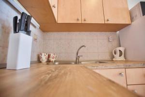Kuchyňa alebo kuchynka v ubytovaní Apartment Gaga Split