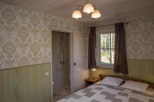 Letto o letti in una camera di Kernuti House