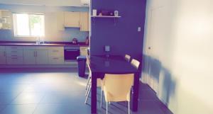 A kitchen or kitchenette at Apartment Curacao