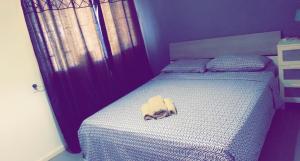 A bed or beds in a room at Apartment Curacao