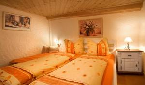 Ferienwohnung Moritz tesisinde bir odada yatak veya yataklar