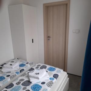 Posteľ alebo postele v izbe v ubytovaní Apartment Moravský Kras