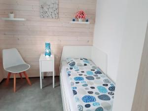 Posteľ alebo postele v izbe v ubytovaní Apartment Moravský Kras