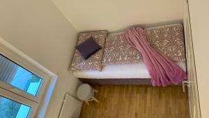 Кровать или кровати в номере Appartements Belli