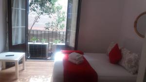 A bed or beds in a room at Casa de Huéspedes Prada