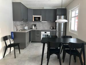 Kuchyň nebo kuchyňský kout v ubytování Soukolo Apartments + 16 fotografií