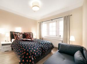 a bedroom with a bed and a window at Ferienwohnung Julia in Suhl