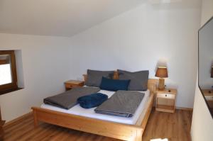 Postel nebo postele na pokoji v ubytování Ferienwohnung Staudach, Apartment