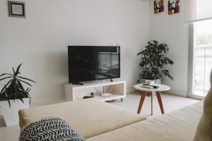 TV a/nebo společenská místnost v ubytování Administración MAIPU 1C DEPTO PREMIUM