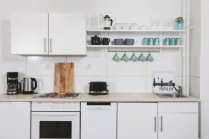 Een keuken of kitchenette bij City Apartment near Shooping Center, 6 guests