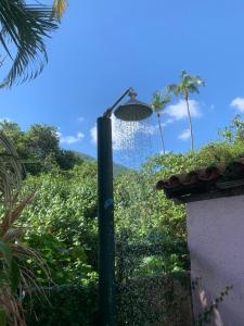 Um jardim em Pousada Solar da Praia