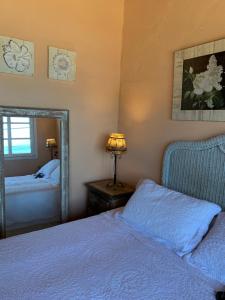 Cama ou camas em um quarto em Pousada Solar da Praia
