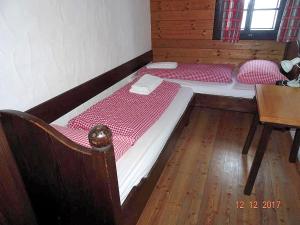 מיטה או מיטות בחדר ב-Apartment Sonnleitn/Nassfeld