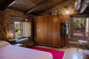 Een bed of bedden in een kamer bij La Casa di Ester nel Cilento