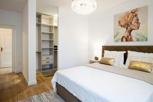 Posteľ alebo postele v izbe v ubytovaní Aurelia Residence
