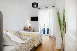 Posteľ alebo postele v izbe v ubytovaní Aurelia Residence