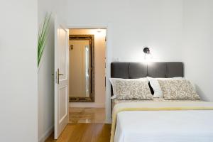 Posteľ alebo postele v izbe v ubytovaní Aurelia Residence